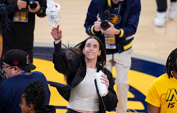 Caitlin Clark revs up Pacers fans with pregame playoff appearance in IndyCar replica