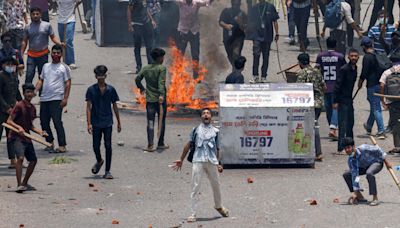 Bangladesh wakes to TV, internet blackout as deadly protests spike