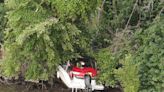 Two adults, two children rescued after boat washed ashore on James River