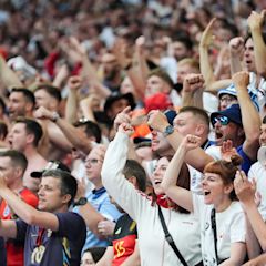 Fans celebrate as Bellingham helps England to dramatic comeback victory at Euros