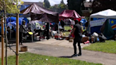 Neighbors call to 'move' asylum seekers out of Seattle park, into shelter