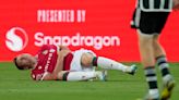 Wrexham striker Paul Mullin injured in collision with Manchester United goalie Nathan Bishop