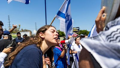 Pro-Palestinian protest outside LA synagogue turns violent, as Biden and others condemn it