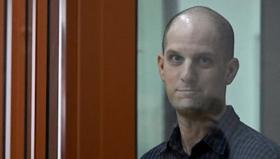 Journalist Evan Gershkovich seen with shaved head as spying trial in Russia starts