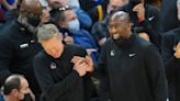 Steve Kerr presents Mike Brown and Leandro Barbosa with 2022 championship rings before Warriors vs. Kings