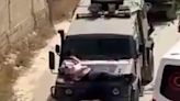 IDF troops 'violated orders' by tying wounded Palestinian to a jeep