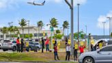 United's flight attendants stage rally after top airline executives receive hefty pay hikes