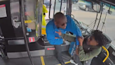WATCH: Bus driver fights off attack, crashes into OKC business