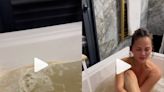 Chrissy Teigen responds to fans pointing out her ‘dirty bathwater’