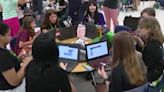 Girls from Gilbert schools practice tech skills building Olympic-themed parade floats