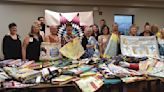 'Millions of stitches of love': Local crafters donate to WARMC Comfort Quilts program