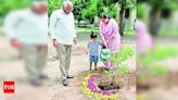 CM and family join 'Ek Ped Maa Ke Naam' campaign, plant sapling | Ahmedabad News - Times of India