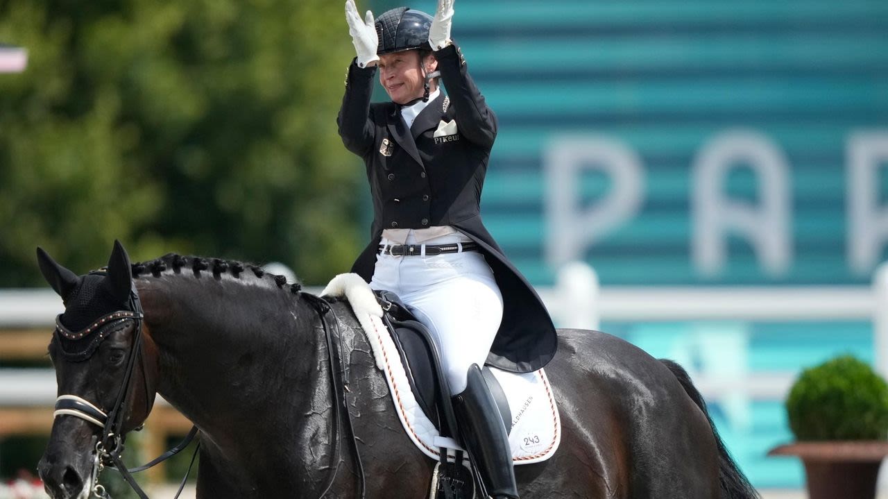 Equestrian star Werth urges better horse welfare but bristles at questions over a suspended rider