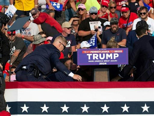 Trump rally attendee says he saw alleged shooter "move from roof to roof"