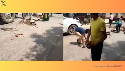 Watch: As liquor boxes fall off a vehicle in Agra, passersby rush to grab bottles