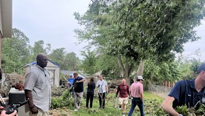 Gov. Sanders, John Calipari help with clean-up efforts in Rogers