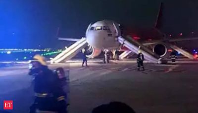 Air India plane forced to make an emergency landing after its engine erupted into flames, with 179 passengers on board