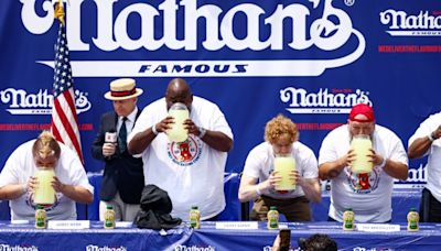 Nathan's Contestant Projectile Vomits Onstage During Lemonade Chugging Contest