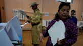 The young democracy of Mongolia begins voting for an expanded 126-seat parliament