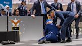 Biden falls on stage during Air Force graduation ceremony