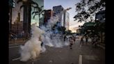 Venezuela Sees Hugo Chávez Statues Toppled in Post-Election Unrest