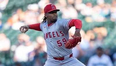 Ron Washington is presented ball from last out of Angels' likely final Oakland visit