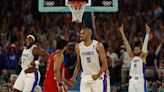 Basketball-France claim rip-roaring win over Canada to reach last four