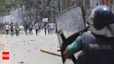 Bangladesh police fire tear gas, sound grenades as protesters return to streets - Times of India