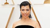 Kourtney Kardashian Flaunts Growing Baby Bump in New Pics