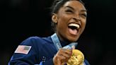 Brilliant Biles leads USA to Olympic women's team gold