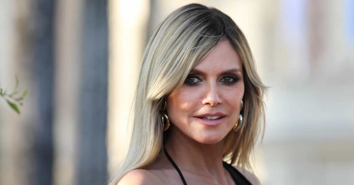 Heidi Klum Sunbathes in Shimmery Itty-Bitty Crochet Bikini