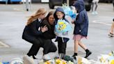 Rob Burrow: Rugby league star's wife and children lay flowers at Headingley Stadium after his death at 41