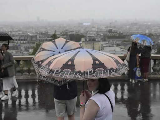 Pouring rain disrupts Olympic Games after drenched opening ceremony - The Economic Times