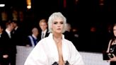 Cara Delevingne's 2023 Met Gala Look Included a Shaggy Platinum Bob and Thigh-High Leg Warmers