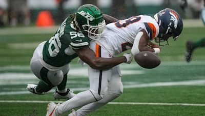 Shock as NFL star Tyler Badie collapses on sideline after huge tackle before being carted off field