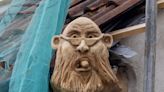 Builder takes revenge against councillor by putting gargoyle of him on roof