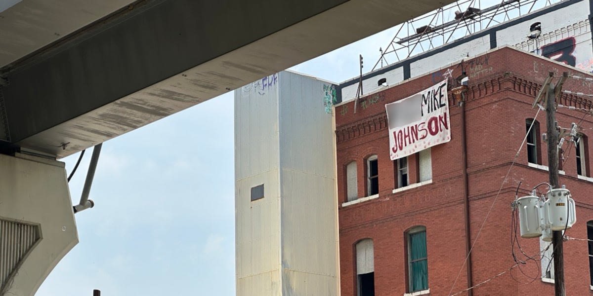 Profane anti-Mike Johnson banner appears on side of abandoned Shreveport building