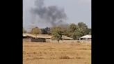 A funeral is held for 20 Cambodian soldiers killed in an arms depot explosion at an army base