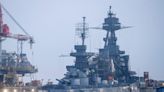 Last-of-its-kind battleship USS Texas returns to the water after months of work to restore the warship to its former glory