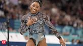 Simone Biles shakes off a calf injury to dominate during Olympic gymnastics qualifying - The Economic Times