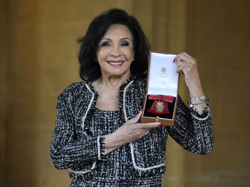 Dame Shirley Bassey admits she 'forgot to curtsy' after being overcome by nerves receiving honour from King