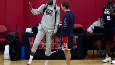 The Phoenix Suns' Kevin Durant, left, chats on the court during training camp for the USA Basketball Men's National Team at UNLV's Mendenhall Center...