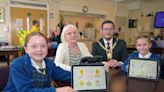 Pupils help tenants at retirement complex in Bellshill improve their digital skills