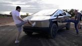 Video Shows Tesla Fans Viciously Kicking the Cybertruck