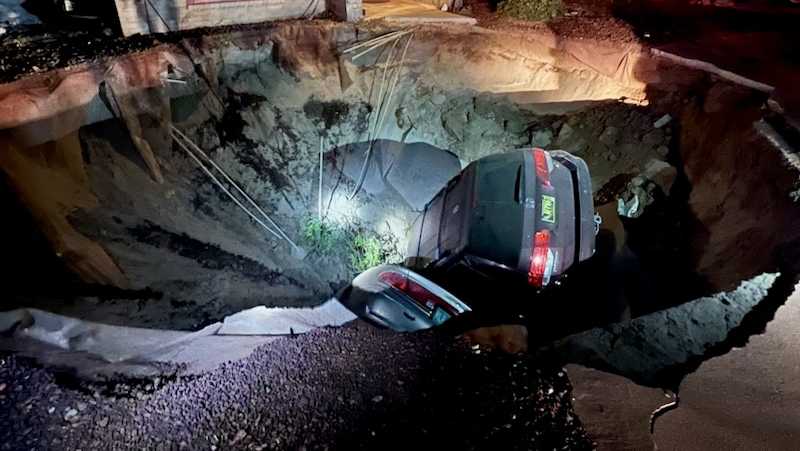 Sinkhole swallows vehicles, forces evacuations in Las Cruces