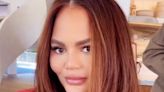 Chrissy Teigen Debuts New Red Hairstyle Weeks After Birth of Baby Esti — See the Look!