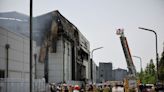 S.Korea battery maker apologises for deadly fire but says it complied with safety rules