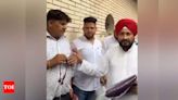 AAP workers caught distributing ration, clothes ahead of Jalandhar bypolls, claims Congress' Charanjit Singh Channi | India News - Times of India