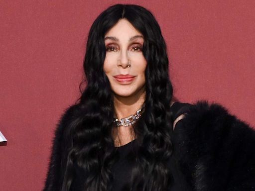 Cher Turns Back Time and Rocks Black Bodysuit Similar to One She Wore 35 Years Ago