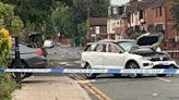 Scene of chaos as car lands on side after four-car crash